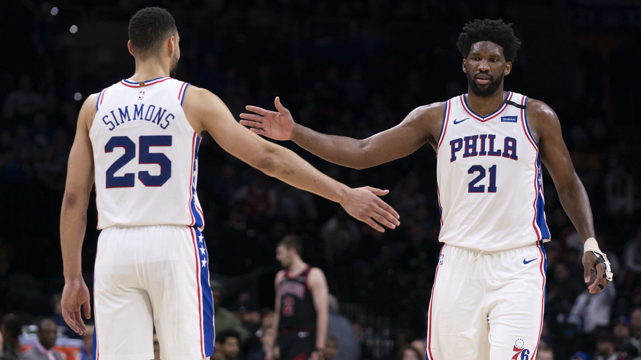 PHILADELPHIA, PA - FEBRUARY 09: Ben Simmons #25 and Joel Embiid #21 of the Philadelphia 76ers react against the Chicago Bulls in the fourth quarter at the Wells Fargo Center on February 9, 2020 in Philadelphia, Pennsylvania. The 76ers defeated the Bulls 118-111. NOTE TO USER: User expressly acknowledges and agrees that, by downloading and/or using this photograph, user is consenting to the terms and conditions of the Getty Images License Agreement.