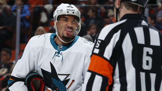 ANAHEIM, CA - APRIL 14: Evander Kane #9 of the San Jose Sharks argues a call with referee Francis Charron #6 in Game Two of the Western Conference First Round against the Anaheim Ducks during the 2018 NHL Stanley Cup Playoffs at Honda Center on April 14, 2018 in Anaheim, California.