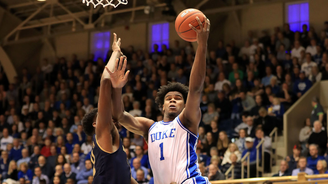 DURHAM, NORTH CAROLINA - FEBRUARY 15: Vernon Carey Jr. #1 of the Duke Blue Devils drives to the basket against Juwan Durham #11 of the Notre Dame Fighting Irish during their game at Cameron Indoor Stadium on February 15, 2020 in Durham, North Carolina.