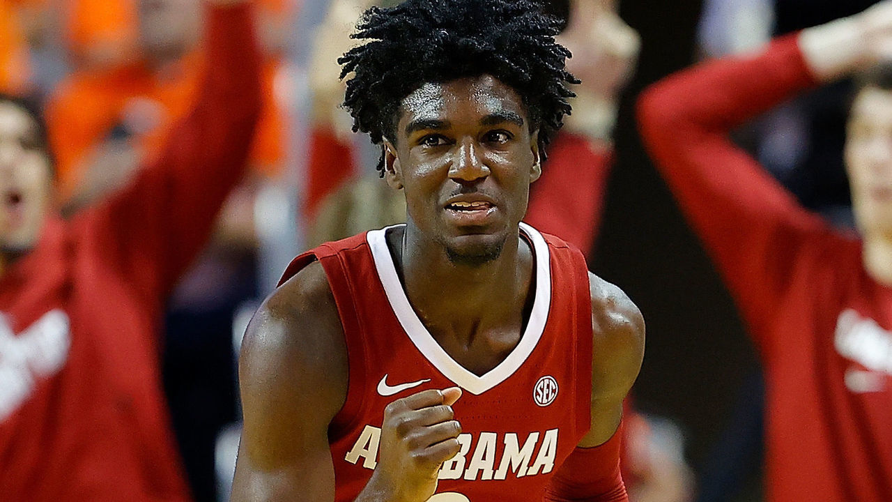 AUBURN, ALABAMA - FEBRUARY 12: Kira Lewis Jr. #2 of the Alabama Crimson Tide reacts after hitting a three-point basket in the second half against the Auburn Tigers at Auburn Arena on February 12, 2020 in Auburn, Alabama.