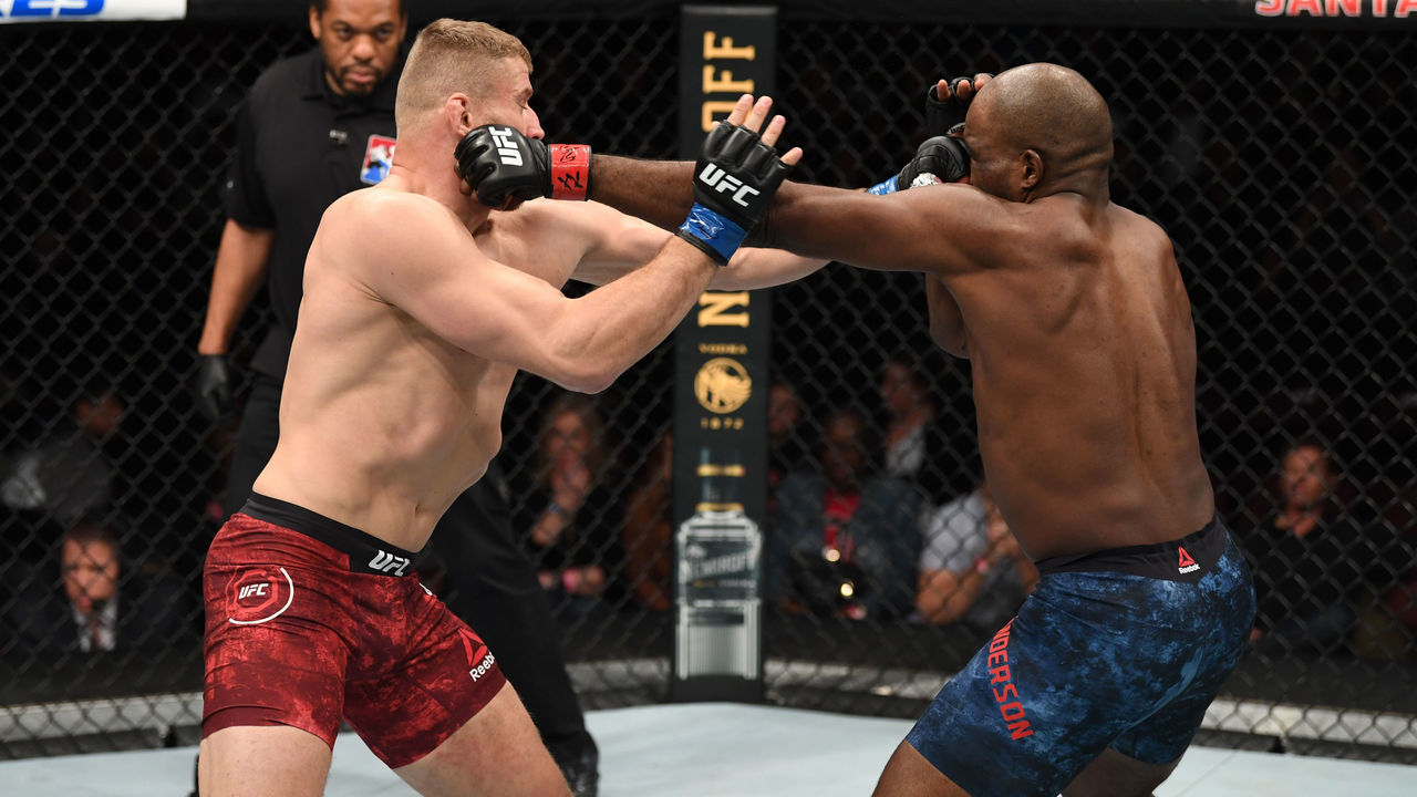 RIO RANCHO, NEW MEXICO - FEBRUARY 15: (L-R) Jan Blachowicz of Poland and Corey Anderson exchange punches in their light heavyweight bout during the UFC Fight Night event at Santa Ana Star Center on February 15, 2020 in Rio Rancho, New Mexico.