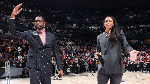 CHICAGO, IL - FEBRUARY 15: NBA and WNBA legends Dwyane Wade and Candace Parker addresses the crowd during the 2020 NBA All-Star - Taco Bell Skills Challenge on February 15, 2020 at the United Center in Chicago, Illinois. Mandatory Copyright Notice: Copyright 2020 NBAE