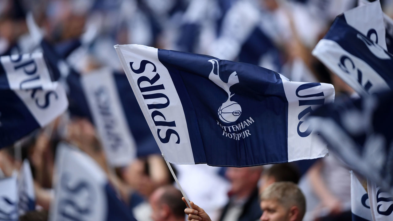 LONDON, ENGLAND - APRIL 21: Tottenham Hotspur fans display flags in support of their side prior to The Emirates FA Cup Semi Final match between Manchester United and Tottenham Hotspur at Wembley Stadium on April 21, 2018 in London, England.