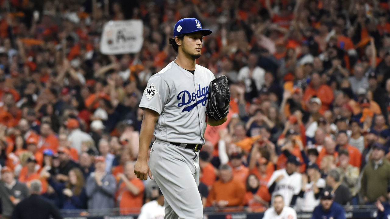 HOUSTON, TX - OCTOBER 27: Yu Darvish #21 of the Los Angeles Dodgers walks back to the dugout during a pitching change during Game 3 of the 2017 World Series against the Houston Astros at Minute Maid Park on Friday, October 27, 2017 in Houston, Texas.
