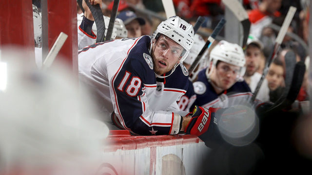 NEWARK, NEW JERSEY - FEBRUARY 16: Pierre-Luc Dubois #18 of the Columbus Blue Jackets looks on from the bench in the third period against the New Jersey Devils at Prudential Center on February 16, 2020 in Newark, New Jersey.The New Jersey Devils defeated the Columbus Blue Jackets 4-3 in a shootout.