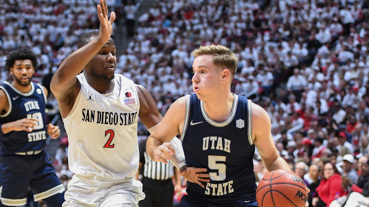 SAN DIEGO, CA - FEBRUARY 01: Utah State Aggies guard Sam Merrill (5) and San Diego State Aztecs guard Adam Seiko (2) during a college basketball game between the Utah State Aggies and the San Diego State Aztecs on February 01, 2020 at Viejas Arena at Aztec Bowl in San Diego, CA.