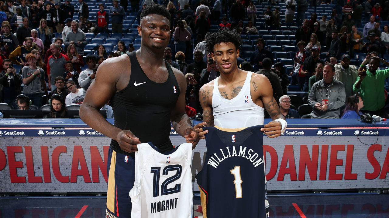 NEW ORLEANS, LA - JANUARY 31: Zion Williamson #1 of the New Orleans Pelicans and Ja Morant #12 of the Memphis Grizzlies swap jerseys after the game on January 31, 2020 at the Smoothie King Center in New Orleans, Louisiana. Mandatory Copyright Notice: Copyright 2020 NBAE