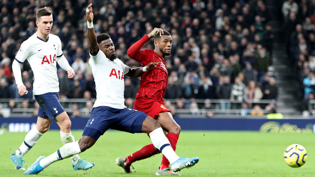 Tottenham defender Serge Aurier tackles Liverpool midfielder Georginio Wijnaldum during the Premier League match between Tottenham Hotspur and Liverpool at the Tottenham Hotspur Stadium, London on Saturday 11th January 2020.