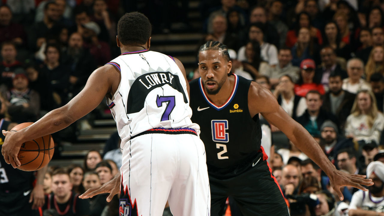 TORONTO, CANADA - DECEMBER 11: Kawhi Leonard #2 of the LA Clippers plays defense against Kyle Lowry #7 of the Toronto Raptors on December 11, 2019 at the Scotiabank Arena in Toronto, Ontario, Canada. Mandatory Copyright Notice: Copyright 2019 NBAE