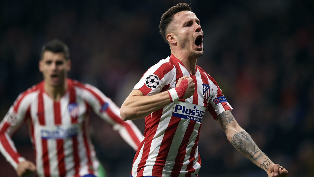 MADRID, SPAIN - FEBRUARY 18: Saul Niguez (R) of Atletico de Madrid celebrates after scoring a goal during the UEFA Champions League round of 16 first leg match between Atletico Madrid and Liverpool FC at Wanda Metropolitano on February 18, 2020 in Madrid, Spain.