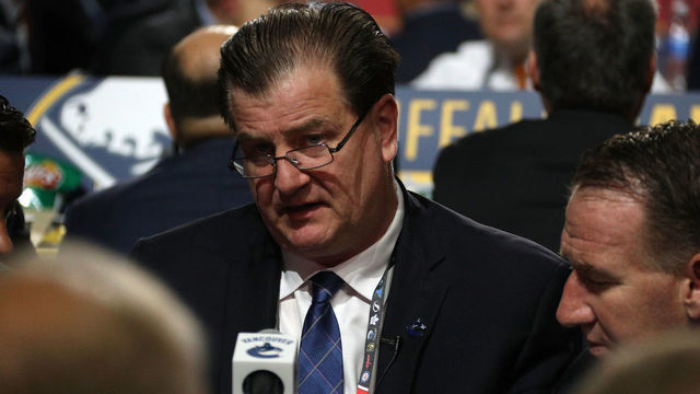 CHICAGO, IL - JUNE 24: General manager Jim Benning of the Vancouver Canucks looks on during the 2017 NHL Draft at United Center on June 24, 2017 in Chicago, Illinois.