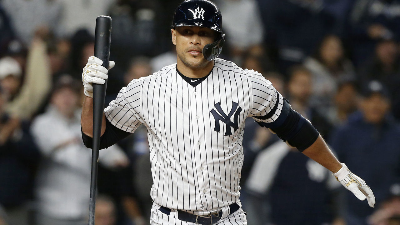 NEW YORK, NEW YORK - OCTOBER 04: (NEW YORK DAILIES OUT) Giancarlo Stanton #27 of the New York Yankees in action against the Minnesota Twins in game one of the American League Division Series at Yankee Stadium on October 04, 2019 in New York City. The Yankees defeated the Twins 10-4.