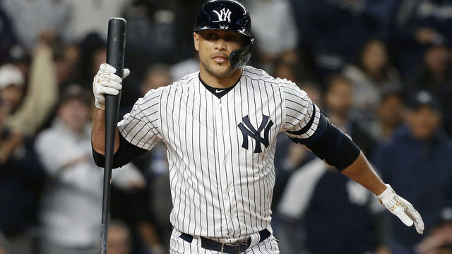 NEW YORK, NEW YORK - OCTOBER 04: (NEW YORK DAILIES OUT) Giancarlo Stanton #27 of the New York Yankees in action against the Minnesota Twins in game one of the American League Division Series at Yankee Stadium on October 04, 2019 in New York City. The Yankees defeated the Twins 10-4.