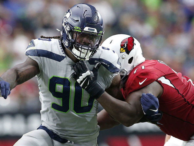 GLENDALE, ARIZONA - SEPTEMBER 29: Defensive end Jadeveon Clowney #90 of the Seattle Seahawks battles through the block of offensive lineman Justin Murray #71 of the Arizona Cardinals during the second half of the NFL football game at State Farm Stadium on September 29, 2019 in Glendale, Arizona.