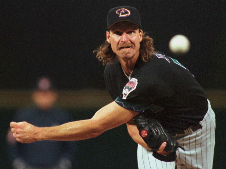 Watch: Randy Johnson calls shot in alumni game, nearly homers ...