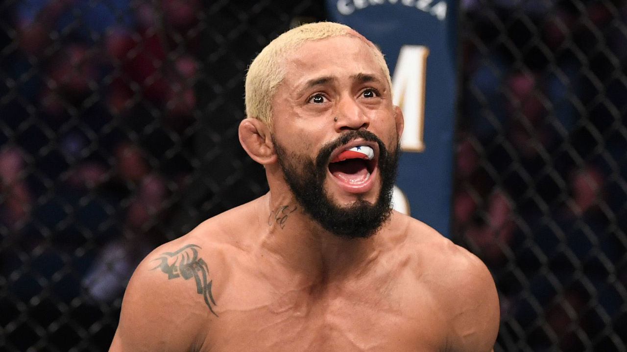 TAMPA, FLORIDA - OCTOBER 12: Deiveson Figueiredo of Brazil celebrates his submission victory over Tim Elliott in their flyweight bout during the UFC Fight Night event at Amalie Arena on October 12, 2019 in Tampa, Florida.