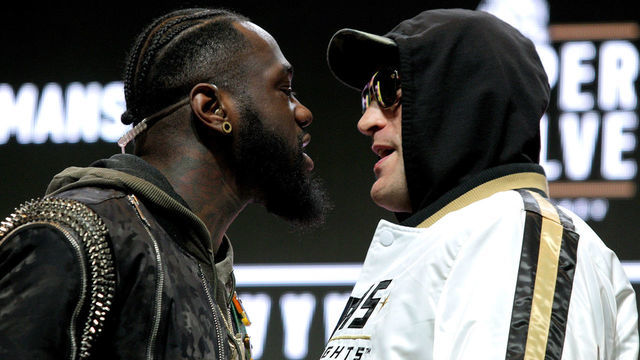 US boxer Deontay Wilder (L) and British boxer Tyson Fury get into an altercation during their press conference February 19, 2020 at the MGM Grand Las Vegas in Las Vegas, Nevada. - The boxers will fight for the World Boxing Council (WBC) Heavyweight Championship Title on February 22, 2020 at the MGM Grand Garden Arena in Las Vegas.