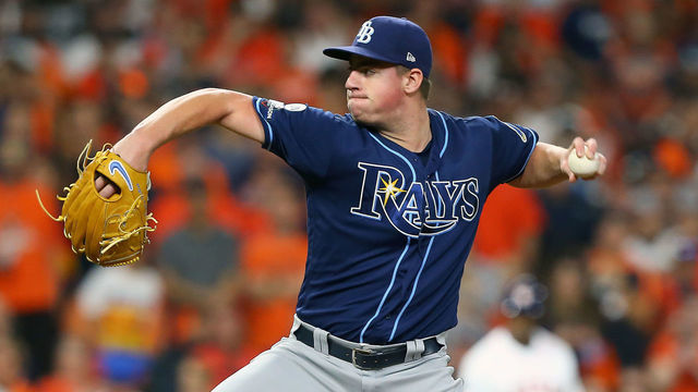 HOUSTON, TEXAS - OCTOBER 10: Brendan McKay #49 of the Tampa Bay Rays delivers the pitch against the Houston Astros during the eighth inning in game five of the American League Division Series at Minute Maid Park on October 10, 2019 in Houston, Texas.