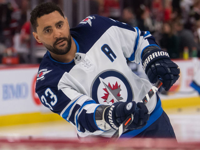 CHICAGO, IL - APRIL 01: Winnipeg Jets defenseman Dustin Byfuglien (33) warms up prior to a game against the Chicago Blackhawks on April 1, 2019, at the United Center in Chicago, IL.