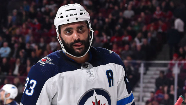 MONTREAL, QC - FEBRUARY 07: Dustin Byfuglien #33 of the Winnipeg Jets looks on against the Montreal Canadiens during the NHL game at the Bell Centre on February 7, 2019 in Montreal, Quebec, Canada. The Montreal Canadiens defeated the Winnipeg Jets 5-2.