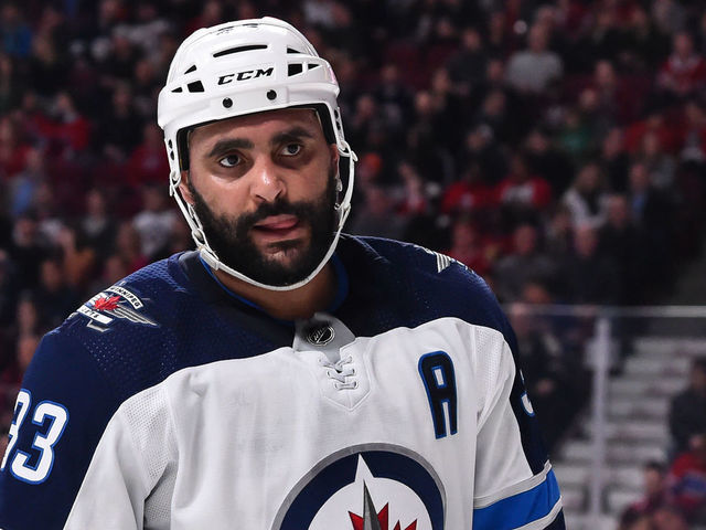 MONTREAL, QC - FEBRUARY 07: Dustin Byfuglien #33 of the Winnipeg Jets looks on against the Montreal Canadiens during the NHL game at the Bell Centre on February 7, 2019 in Montreal, Quebec, Canada. The Montreal Canadiens defeated the Winnipeg Jets 5-2.