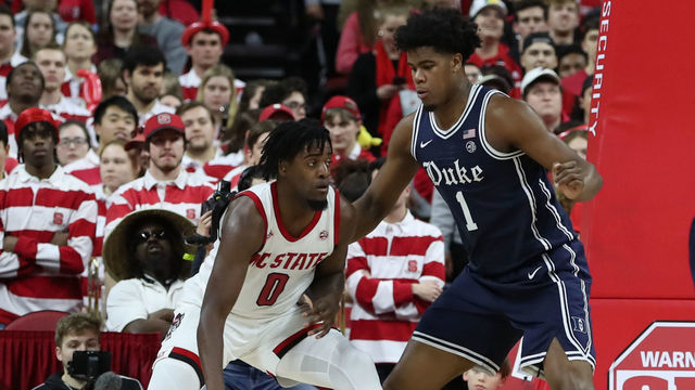 RALEIGH, NC - FEBRUARY 19: North Carolina State Wolfpack forward DJ Funderburk (0) drives the basket as Duke Blue Devils center Vernon Carey Jr. (1) defends during an NCAA Men's basketball game between the North Carolina State Wolfpack and the Duke Blue Devils on February 19, 2020 at the PNC Arena in Raleigh, NC.