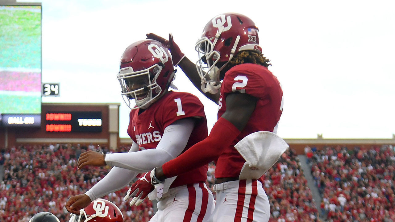 NORMAN, OK - SEPTEMBER 22: Kyler Murray #1 and CeeDee Lamb #2 of the Oklahoma Sooners celebrate a touchdown against the Army West Point Black Knights at Gaylord Family-Oklahoma Memorial Stadium on September 22, 2018 in Norman, Oklahoma.