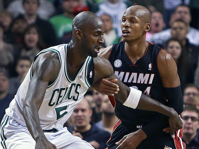 BOSTON - JANUARY 27: The Celtics' Kevin Garnett, left, was guarded by former teammate and current Heat guard Ray Allen in the fourth quarter as the Boston Celtics hosted the Miami Heat in an NBA regular season game at the TD Garden.