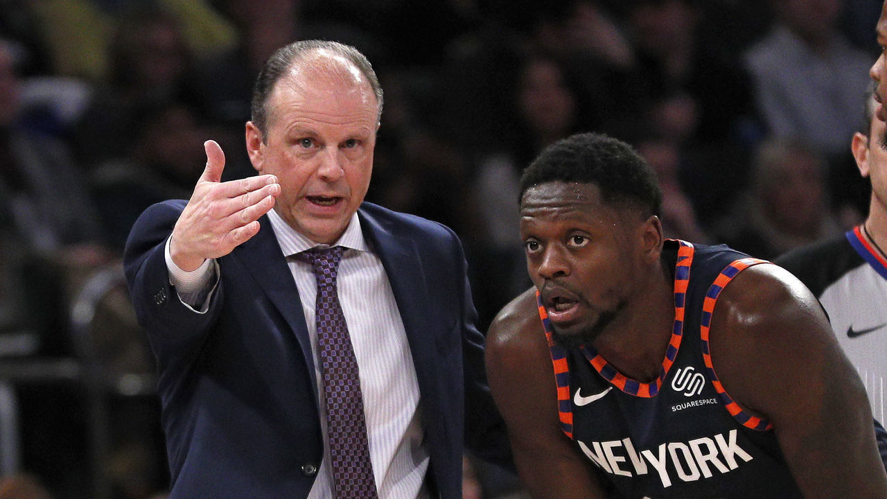 NEW YORK, NY - DECEMBER 07: Mike Miller, in his first game as interim coach of the New York Knicks, talks with Julius Randle #30 and Dennis Smith Jr. #5 of the Knicks during an NBA basketball game against the Indiana Pacers on December 7, 2019 at Madison Square Garden in New York City. Pacers won 104-103. NOTE TO USER: User expressly acknowledges and agrees that, by downloading and/or using this Photograph, user is consenting to the terms and conditions of the Getty License agreement. Mandatory Copyright Notice