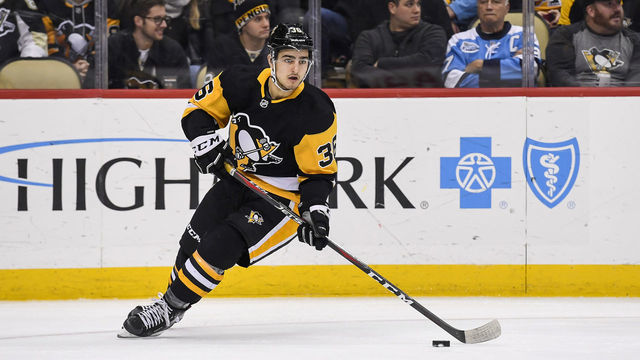 PITTSBURGH, PA - JANUARY 02: Pittsburgh Penguins Center Joseph Blandisi (36) skates with the puck during the third period in the NHL game between the Pittsburgh Penguins and the San Jose Sharks on January 2, 2020, at PPG Paints Arena in Pittsburgh, PA.
