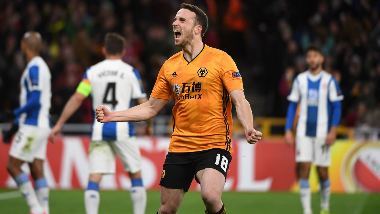 WOLVERHAMPTON, ENGLAND - FEBRUARY 20: Diogo Jota of Wolverhampton Wanderers celebrates after scoring a goal to make it 1-0 during the UEFA Europa League round of 32 first leg match between Wolverhampton Wanderers and Espanyol Barcelona at Molineux on February 20, 2020 in Wolverhampton, United Kingdom.
