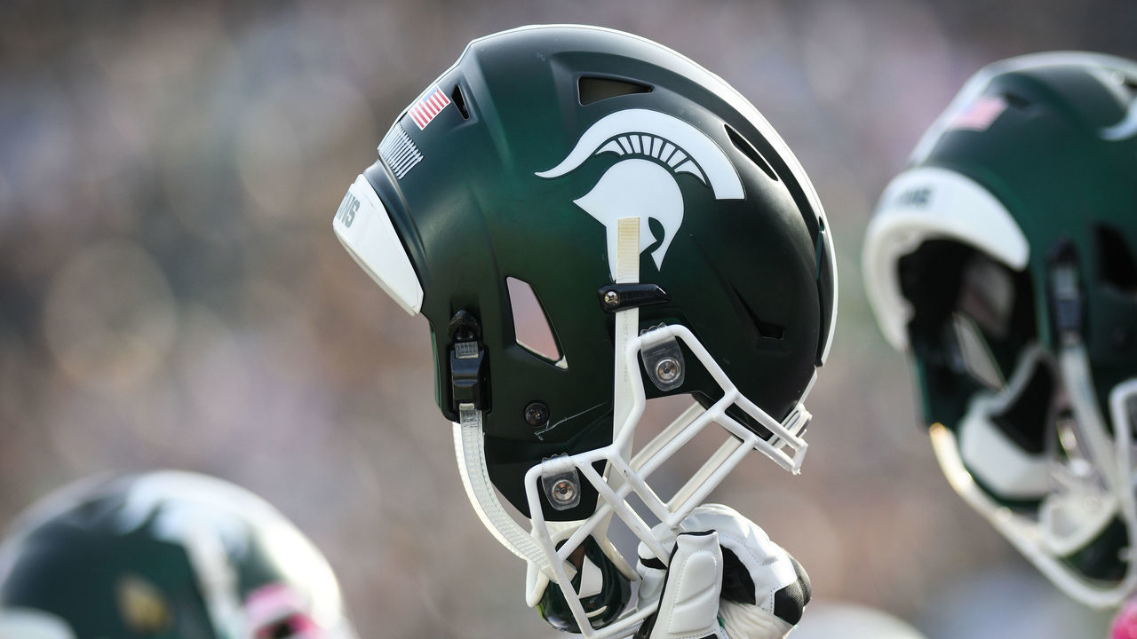 EAST LANSING, MI - OCTOBER 21: A Spartan helmet is raised in the air during the opening kick off of a Big Ten Conference NCAA football game between Michigan State and Indiana on October 21, 2017, at Spartan Stadium in East Lansing, MI. Michigan State defeated Indiana 17-9.