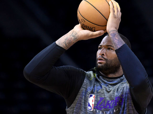 SAN FRANCISCO, CALIFORNIA - FEBRUARY 08: Injured Los Angeles Lakers DeMarcus Cousins #15 works out shooting prior to the start of an NBA basketball game against the Golden State Warriors at Chase Center on February 08, 2020 in San Francisco, California.