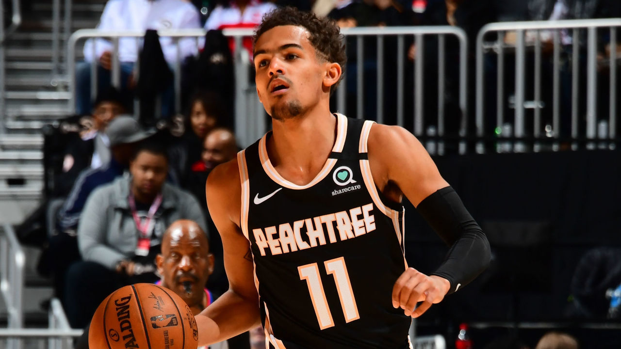 ATLANTA, GA - FEBRUARY 2020: Trae Young #11 of the Atlanta Hawks handles the ball against the Miami Heat on February 20, 2020 at State Farm Arena in Atlanta, Georgia. NOTE TO USER: User expressly acknowledges and agrees that, by downloading and/or using this Photograph, user is consenting to the terms and conditions of the Getty Images License Agreement. Mandatory Copyright Notice: Copyright 2020 NBAE