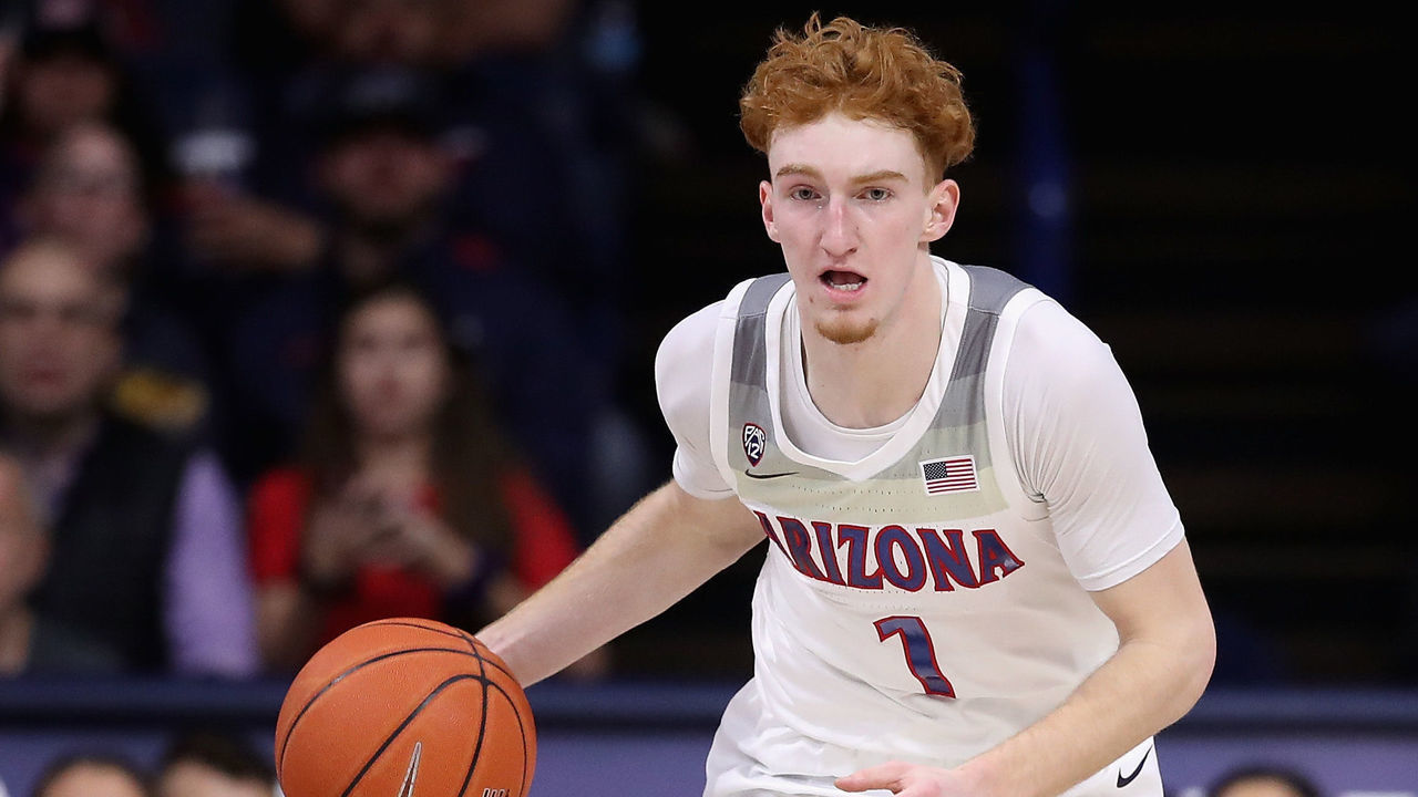 TUCSON, ARIZONA - JANUARY 16: Nico Mannion #1 of the Arizona Wildcats handles the ball during the first half of the NCAA men's basketball game against the Utah Utes at McKale Center on January 16, 2020 in Tucson, Arizona.