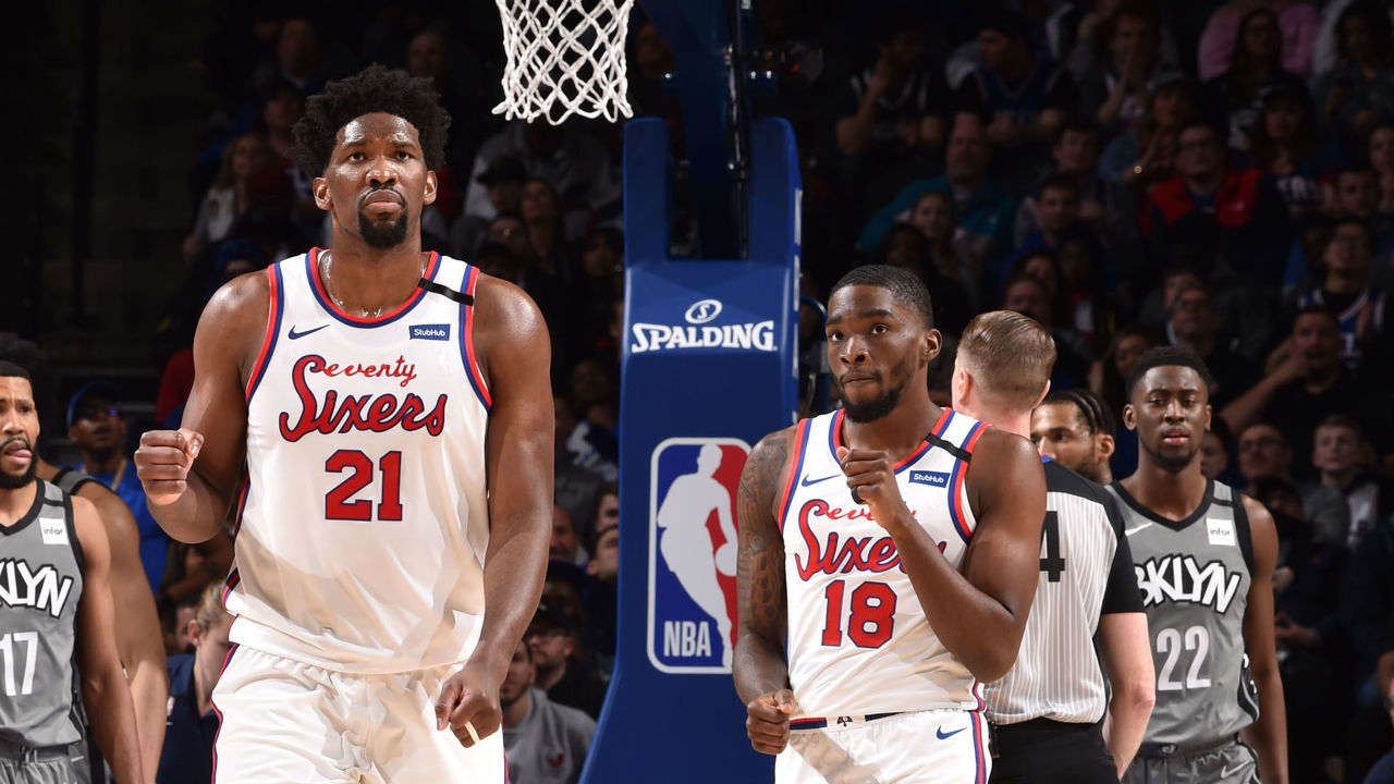 PHILADELPHIA, PA - FEBRUARY 20: Joel Embiid #21 of the Philadelphia 76ers and Shake Milton #18 of the Philadelphia 76ers react during a game against the Brooklyn Nets on February 20, 2020 at the Wells Fargo Center in Philadelphia, Pennsylvania NOTE TO USER: User expressly acknowledges and agrees that, by downloading and/or using this Photograph, user is consenting to the terms and conditions of the Getty Images License Agreement. Mandatory Copyright Notice: Copyright 2020 NBAE