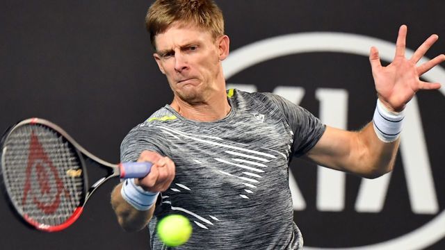 South Africa's Kevin Anderson hits a return against Taylor Fritz of the US during their men's singles match on day four of the Australian Open tennis tournament in Melbourne on January 23, 2020.