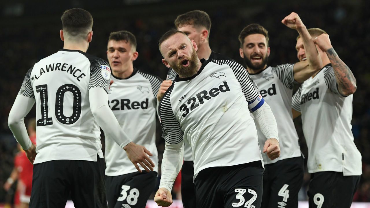 DERBY, ENGLAND - FEBRUARY 21: Wayne Rooney of Derby celebrates scoring the opening goal from a penalty during the Sky Bet Championship match between Derby County and Fulham at Pride Park Stadium on February 21, 2020 in Derby, England.