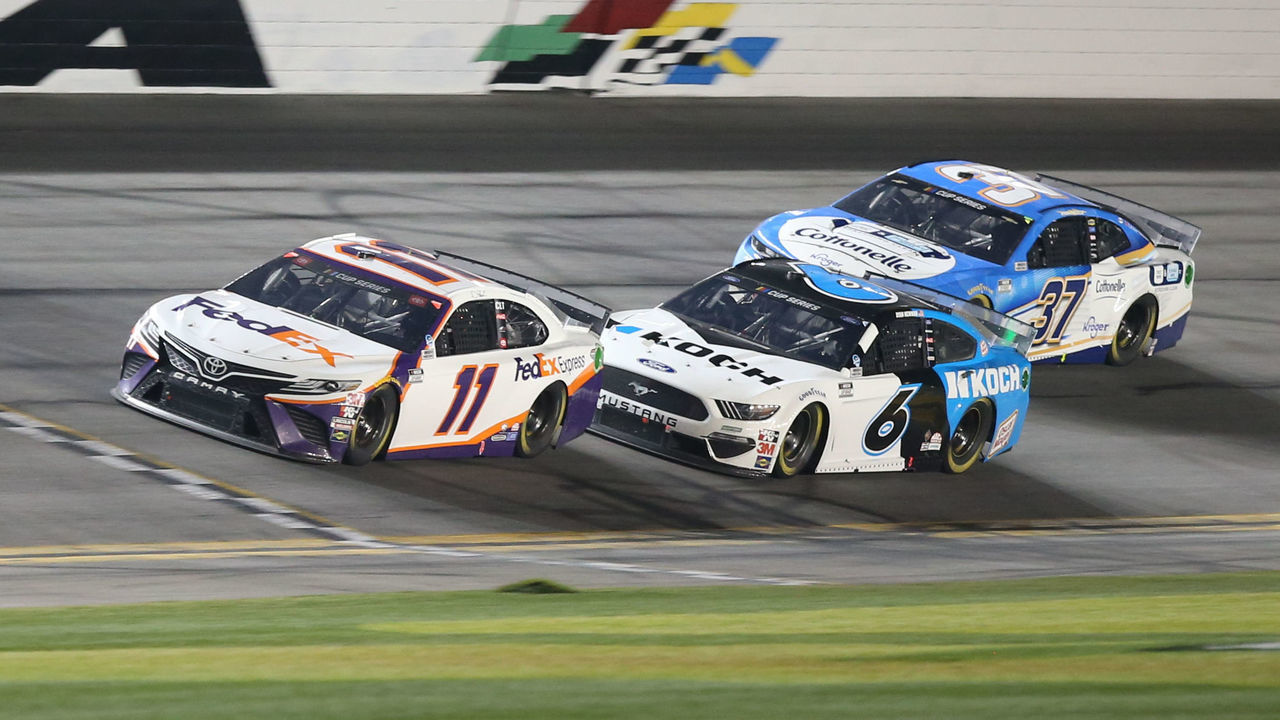 DAYTONA, FL - FEBRUARY 17: Denny Hamlin, driver of the #11 Joe Gibbs Racing FedEx Express Toyota Camry, leads Ryan Newman, driver of the #6 Roush Fenway Racing Koch Industries Ford Mustang, and Ryan Preece, driver of the #37 JTG Daugherty Racing Cottonelle Chevrolet Camaro, during the Daytona 500 on February 17, 2020 at Daytona International Speedway in Daytona Beach, Fl.