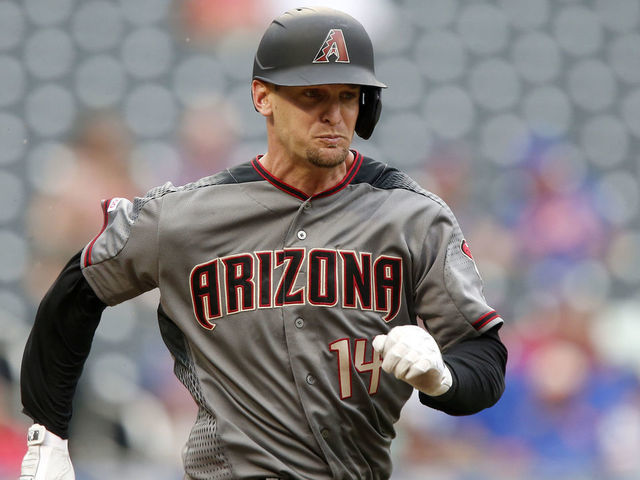 NEW YORK, NEW YORK - SEPTEMBER 12: Caleb Joseph #14 of the Arizona Diamondbacks in action against the New York Mets at Citi Field on September 12, 2019 in New York City. The Mets defeated the Diamondbacks 11-1.