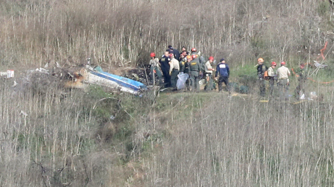 CALABASAS, CALIFORNIA - JANUARY 27: Emergency personnel work at the helicopter crash site that claimed the life of former NBA great Kobe Bryant on January 27, 2020 in Calabasas, California. Bryant, 41, his daughter Gianna, 13, and seven others perished in the accident yesterday.