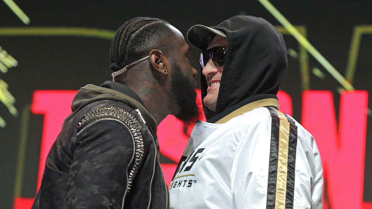 US boxer Deontay Wilder (L) and British boxer Tyson Fury get into an altercation during their press conference February 19, 2020 at the MGM Grand Las Vegas in Las Vegas, Nevada. - The boxers will fight for the World Boxing Council (WBC) Heavyweight Championship Title on February 22, 2020 at the MGM Grand Garden Arena in Las Vegas.