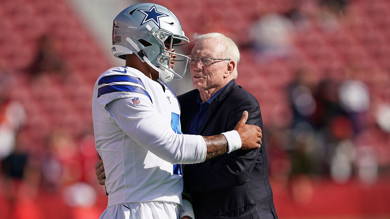 SANTA CLARA, CA - AUGUST 10: Quarterback Dak Prescott #4 and team owner Jerry Jones of the Dallas Cowboys hug each other during pregame warm ups prior to the start of an NFL preseason football game against the San Francisco 49ers at Levi's Stadium on August 10, 2019 in Santa Clara, California.