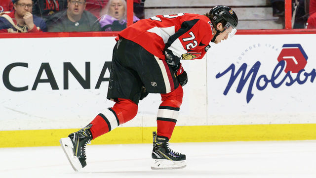 OTTAWA, ON - FEBRUARY 22: Thomas Chabot #72 of the Ottawa Senators limps off the ice after crashing into the boards on a check by Brendan Gallagher #11 of the Montreal Canadiens (not pictured) in the first period at Canadian Tire Centre on February 22, 2020 in Ottawa, Ontario, Canada.