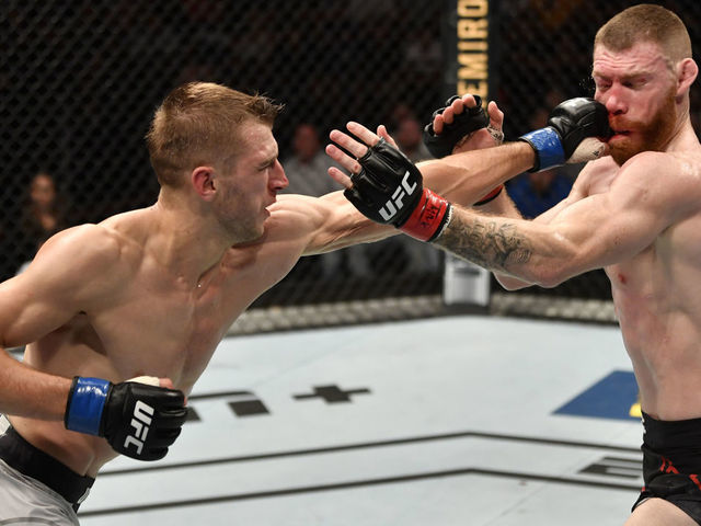 AUCKLAND, NEW ZEALAND - FEBRUARY 23: (L-R) Dan Hooker of New Zealand punches Paul Felder in their lightweight during the UFC Fight Night event at Spark Arena on February 23, 2020 in Auckland, New Zealand.