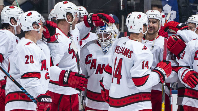 TORONTO, ON - FEBRUARY 22: Emergency backup goaltender Dave Ayres #90 of the Carolina Hurricanes celebrates with teammates after defeating the Toronto Maple Leafs at the Scotiabank Arena on February 22, 2020 in Toronto, Ontario, Canada.