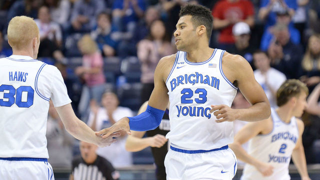 PROVO, UT - DECEMBER 21: Brigham Young Cougars forward Yoeli Childs (23) get congratulated after a basket by Brigham Young Cougars guard TJ Haws (30) during a game between the Weber State Wildcats and the BYU Cougars on December 21, 2019, at the Marriott Center in Provo, Utah.