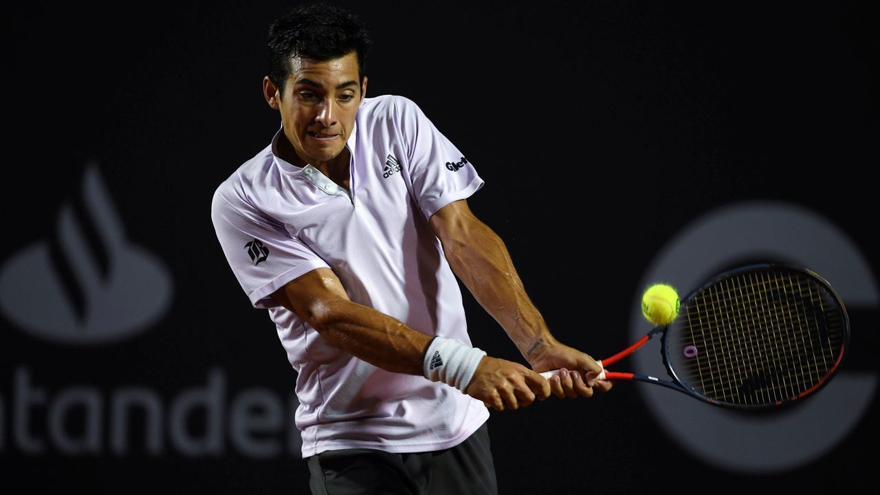 Chile's Cristian Garin hits the ball during a semifinal match against Croatia's Borna Coric at the ATP World Tour Rio Open 2020 tennis tournament at the Jockey Club in Rio de Janeiro, Brazil, early on February 23, 2020.