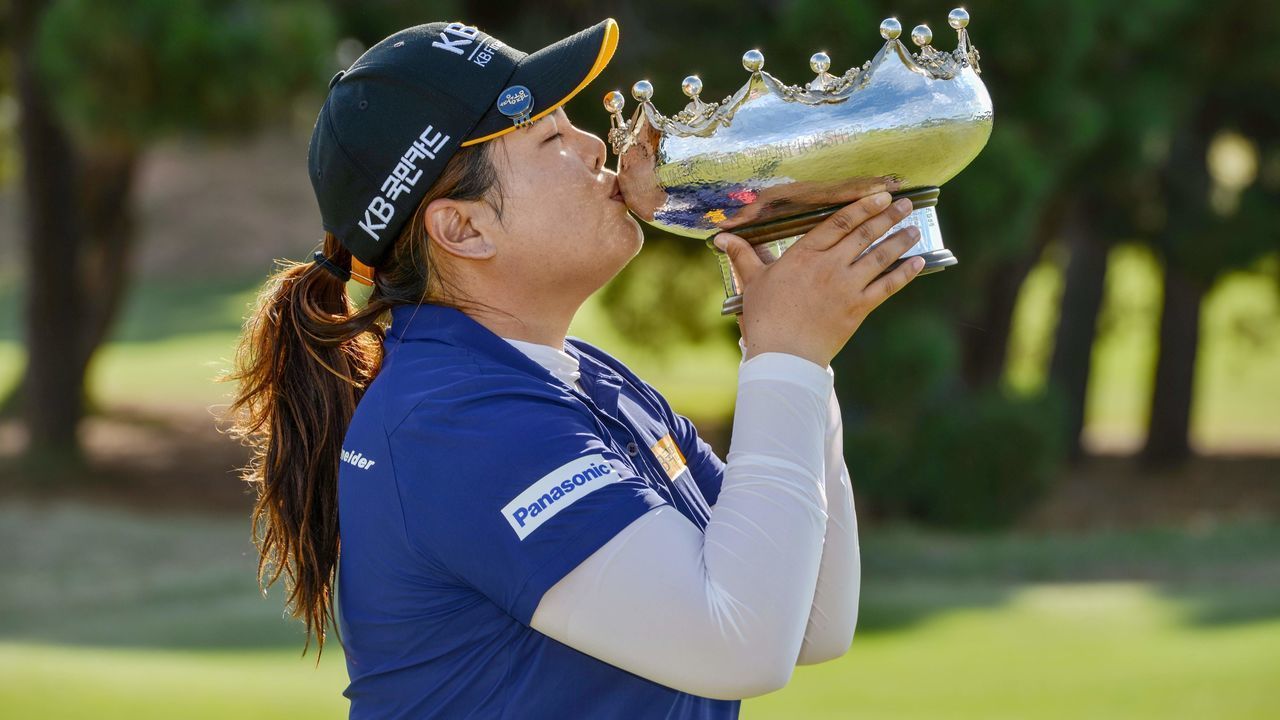 Park In-bee of South Korea kisses the trophy after winning on the final day of the LPGA Australian Open golf tournament at the Royal Adelaide Golf Club in Adelaide on February 16, 2020.