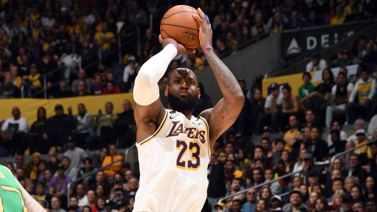 LOS ANGELES, CA - FEBRUARY 23: LeBron James #23 of the Los Angeles Lakers shoots a three point basket during the game against the Boston Celtics on February 23, 2020 at STAPLES Center in Los Angeles, California. NOTE TO USER: User expressly acknowledges and agrees that, by downloading and/or using this Photograph, user is consenting to the terms and conditions of the Getty Images License Agreement. Mandatory Copyright Notice: Copyright 2020 NBAE